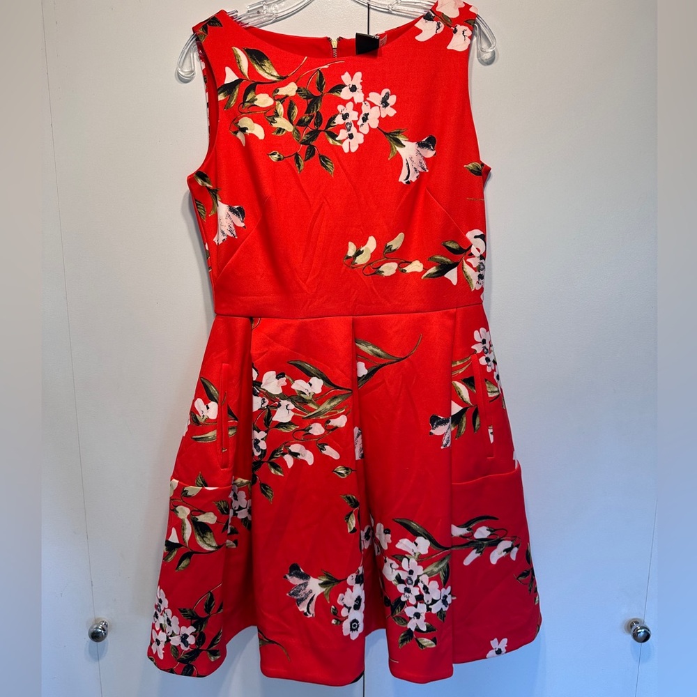 Taylor Fit and Flare, red floral mini dress w/ pockets and seem details.